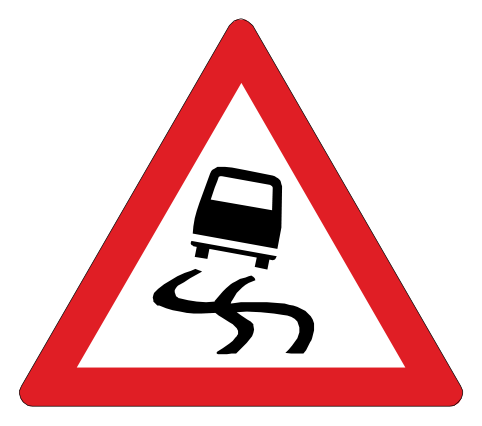 Slippery road ahead, especially when wet. Drive with caution