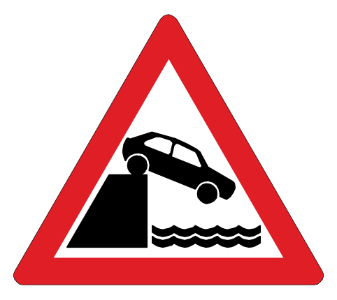 Jetty edge or river bank ahead, close to the road