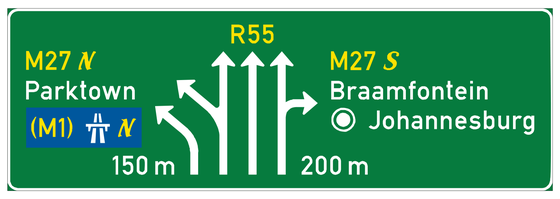 The white signs or inserts are local direction signs within a town or city